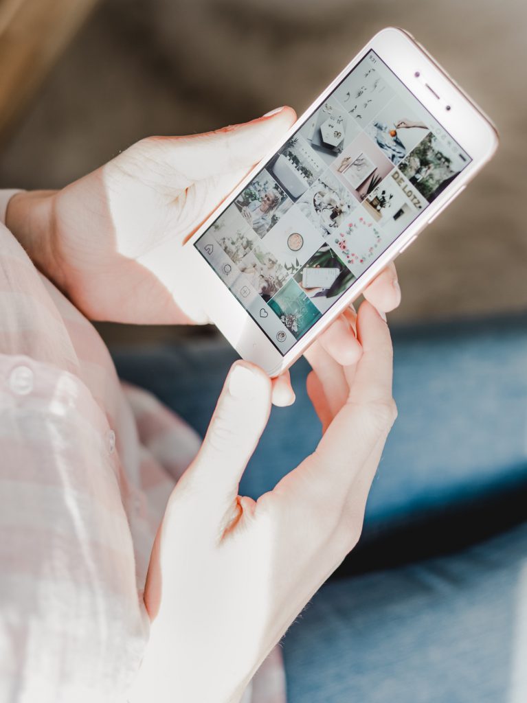 Woman looking at Instagram on Phone